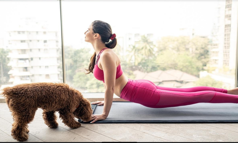 Andriani’s good mood mantra: Doing yoga with her pet