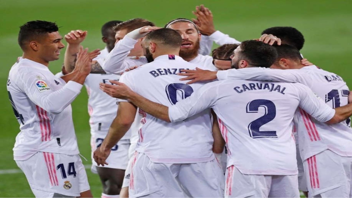 REAL MADRID BEAT GRANADA TO TIE ATLETICO ON POINTS