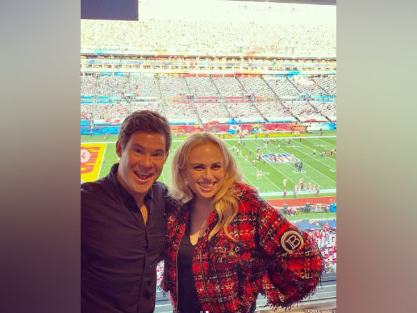 Super Bowl 2021: Rebel Wilson poses alongside ‘Pitch Perfect’ co-star Adam Devine