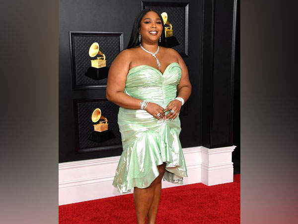 Lizzo rocks a seafoam green dress at 2021 Grammys