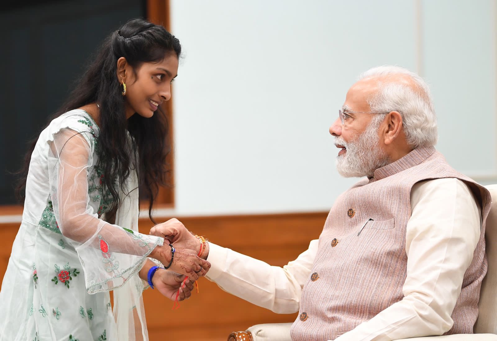 PM Modi celebrates Raksha Bandhan with daughters of PMO staff