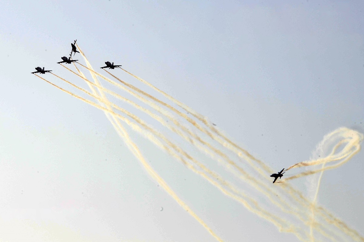 A fleet of aircraft conducts a fly past during the inauguration of 18th National Jamboree 