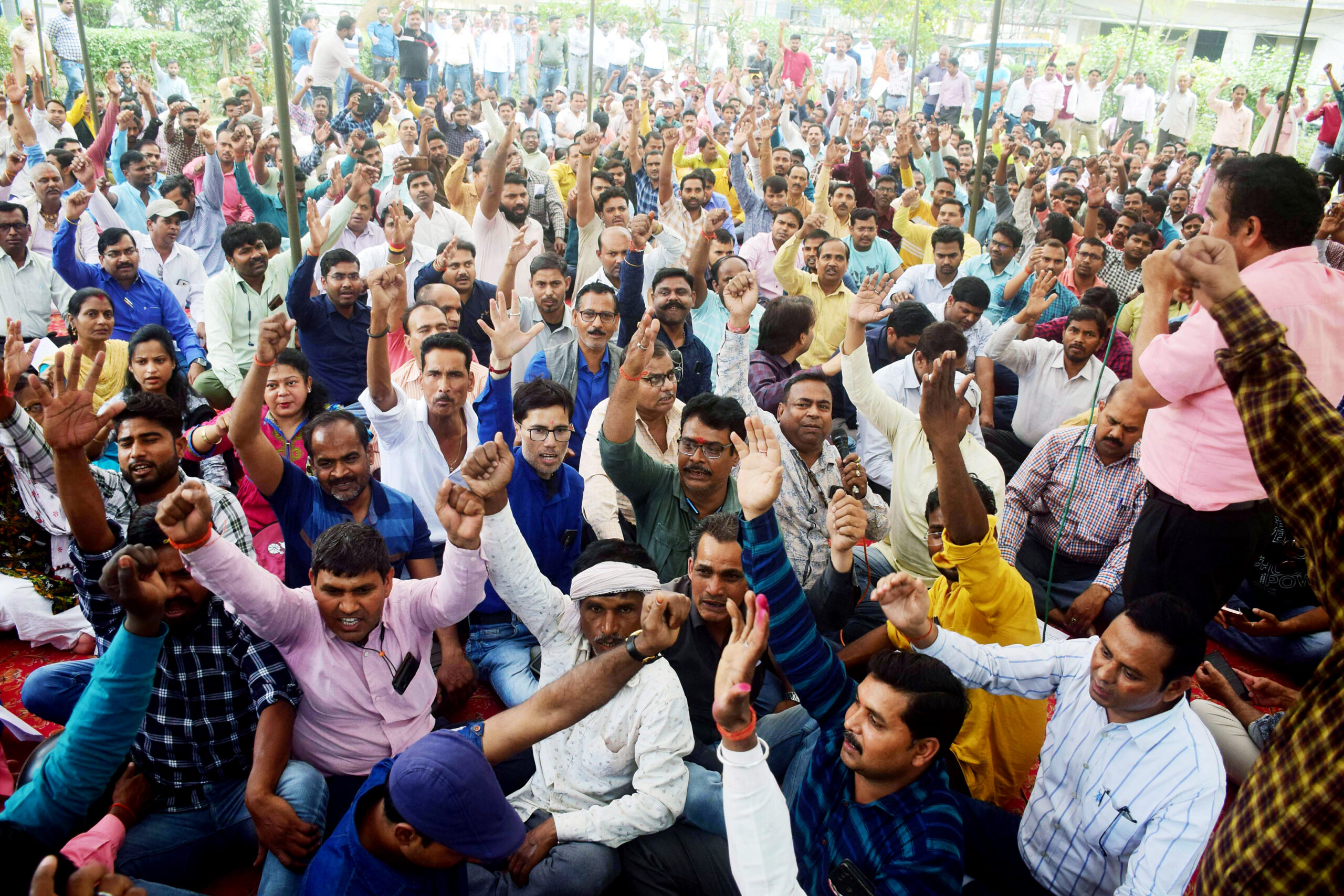 Power department employees stage a protest