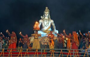 Artists perform Ganga aarti during the 35th International Yoga Festival at Parmarth Niketan