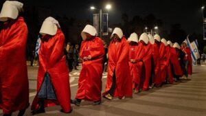 Demonstration against judiciary overhaul, women protest in red form in israel