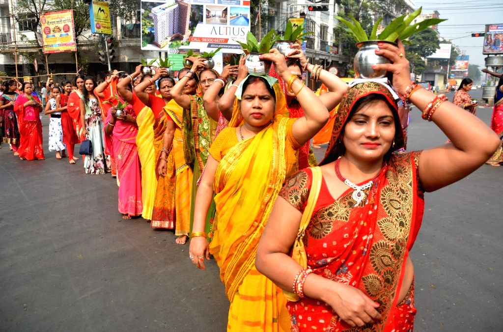 Devotees participate in the Kalash Yatra on the occasion of 226th year old historical Baresohariya Bhaona festival celebration