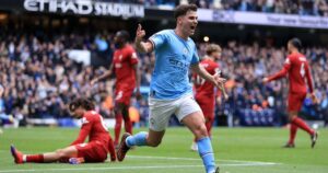 Manchester City defeats Liverpool to mount pressure on leaders Arsenal