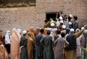 Long queues show desperation in Pakistan over ‘fight for food’