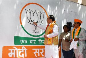 JP Nadda paints party’s election symbol ‘Lotus’