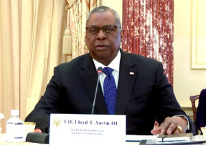 US Defence Secretary Lloyd Austin examines the Tri-Service Guard of Honour