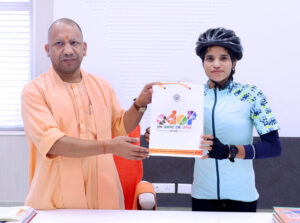 UP CM Yogi Adityanath meets mountaineer and cyclist Asha Malviya