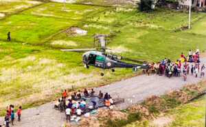 IAF helicopters drop food packets in the flood-affected area