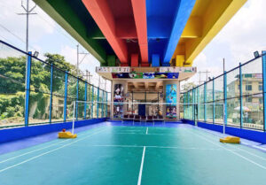 The innovative use of space beneath the Railway Over Bridge for a badminton court