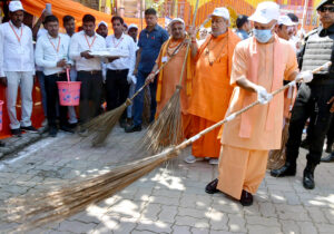 Uttar Pradesh Chief Minister Yogi Adityanath takes part in a cleanliness drive as part of the ‘Swachhata Hi Sewa’ campaign and to commemorate the 154th birth anniversary of Mahatma Gandhi at Naimisharanya Dham, in Sitapur on Sunday. ANI