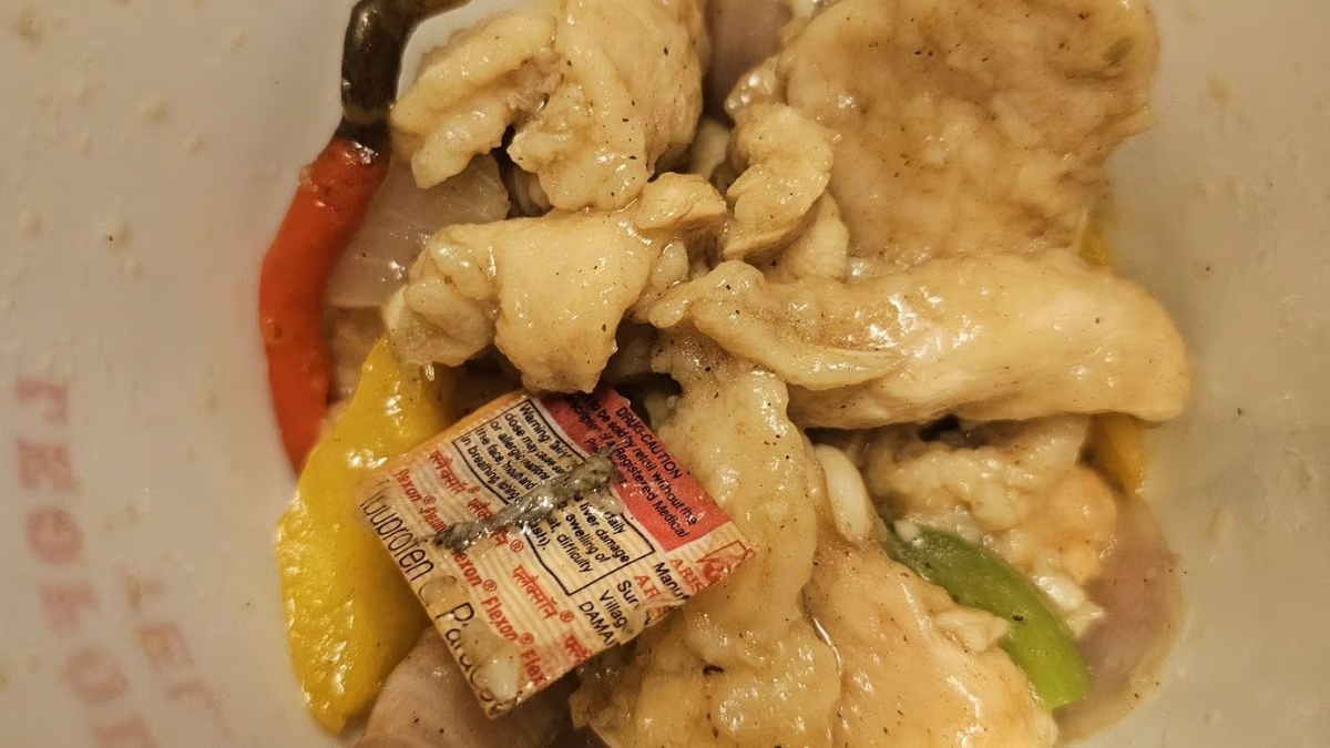 Medicine strip found in chicken meal ordered online with Leopold Cafe