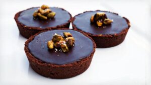 PISTACHIO CHOCOLATE TART WITH CARAMEL MASCARPONE & GANACHE