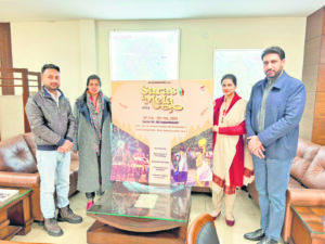 Deputy Commissioner unveils poster of SARAS Mela