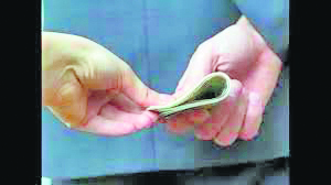 Two ACB employees caught RED-HANDED accepting bribes