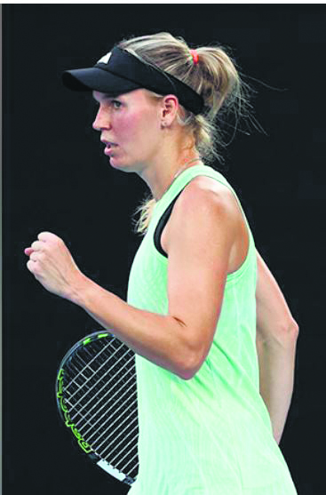 Australian Open: Wozniacki moves into second round after Linette retires