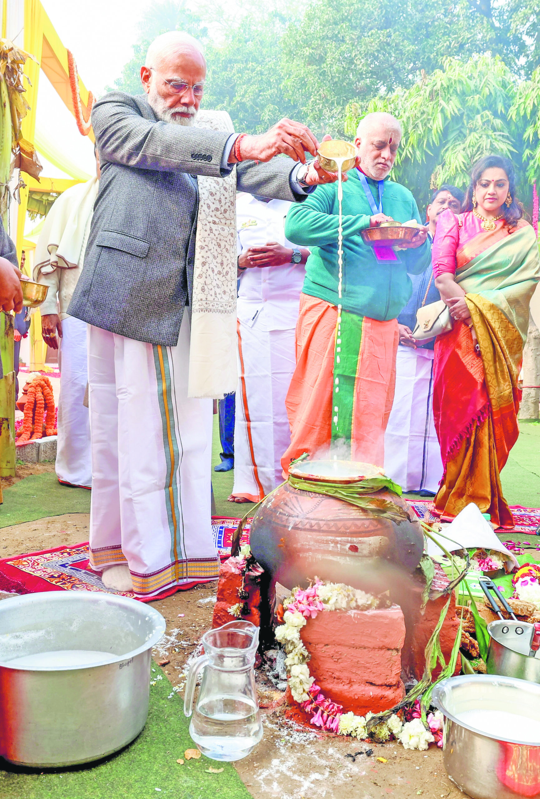 PM Modi gifts his shawl to young singer during Pongal celebrations