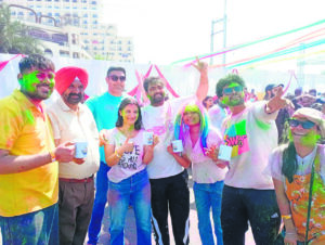 Administration continues voter awareness drives at Holi celebrations