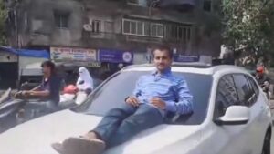 Teen Caught Driving BMW Without License With Man On Bonnet In Kalyan; Case Registered