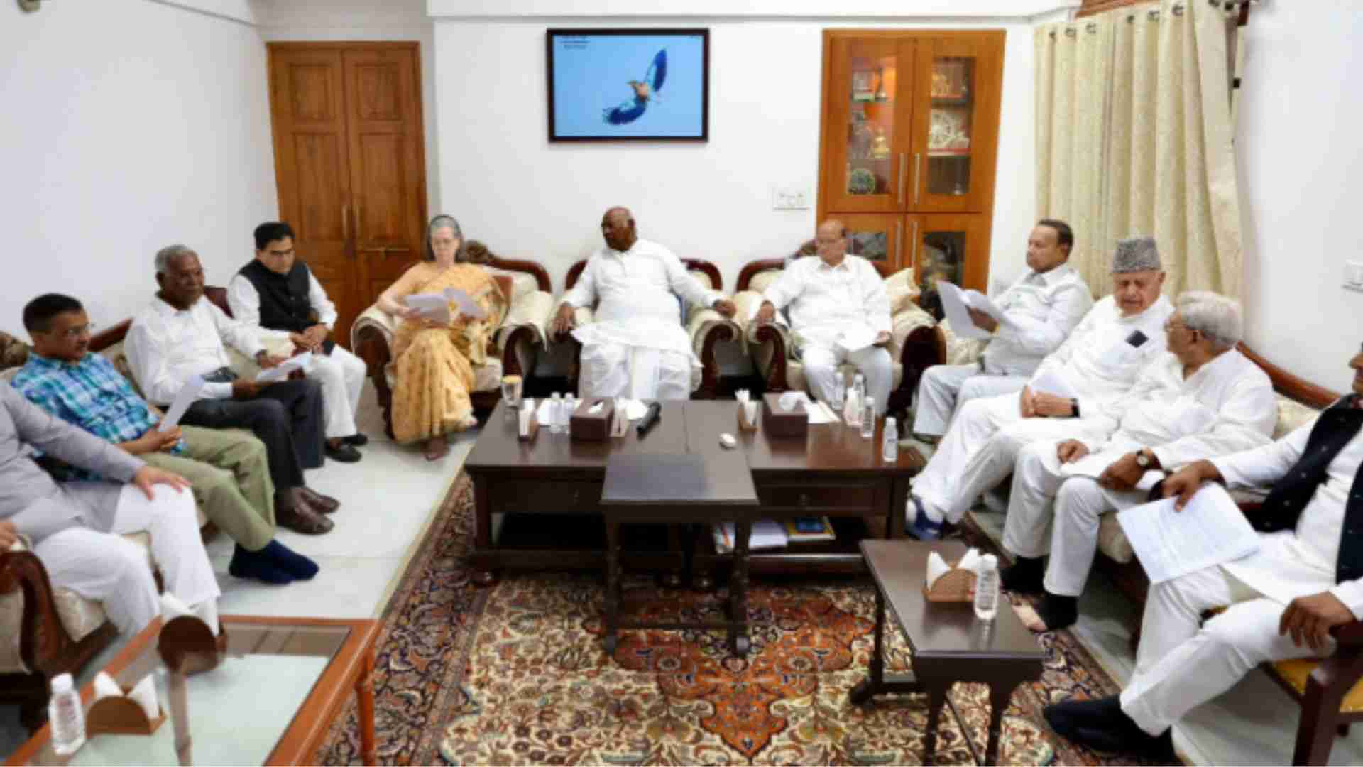 INDIA alliance leaders show victory sign as their meeting concludes at the residence of Congress President Mallikarjun Kharge.