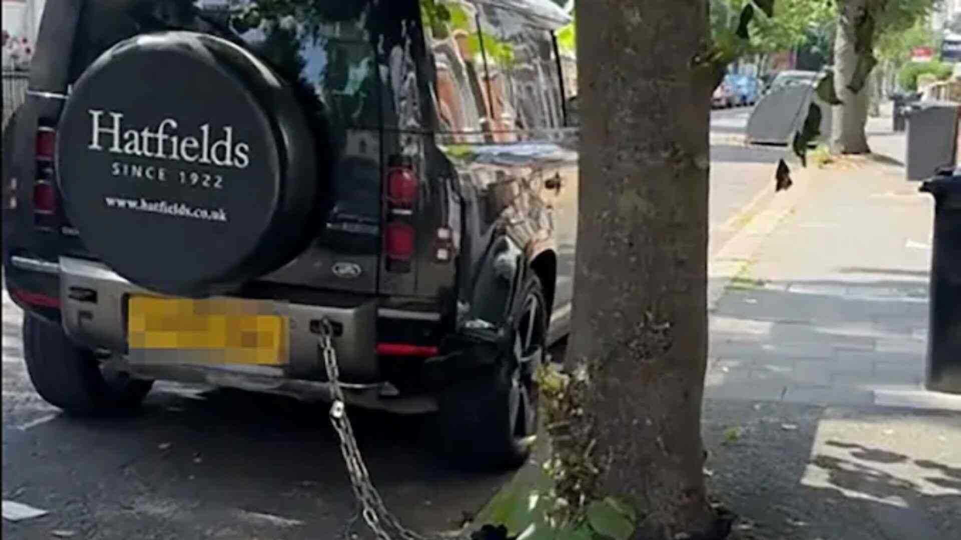 High-End Land Rover Defender Chained To Tree In London To Deter Theft