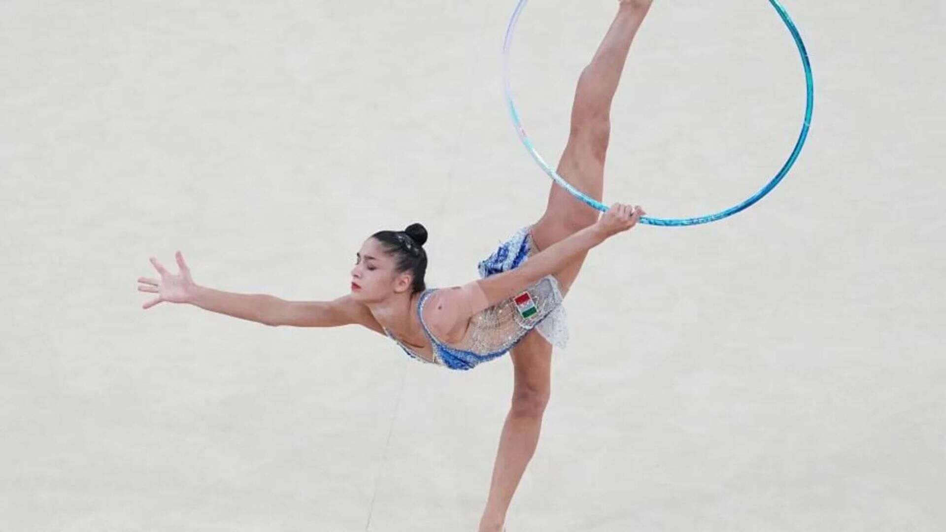 Why Italian Rhythmic Gymnastics Coach Claudia Mancinelli Is Captivating The Internet