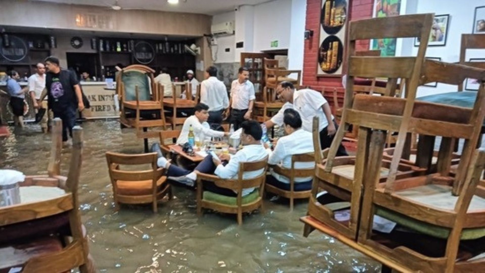 Journalists Unfazed By Floods: Delhi Press Club’s Viral Photo | Watch