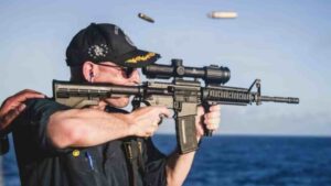 US Navy Commander Relieved of Duty Following Viral Backwards Rifle Scope Photo Incident