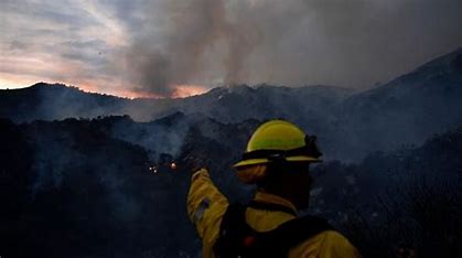 Wildfires Surround Los Angeles, Forcing Evacuations And Choking Sky