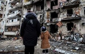 Russian Bomb Hits Ukrainian Apartment, Killing Boy, Sparking Urgent Plea From Zelenskyy