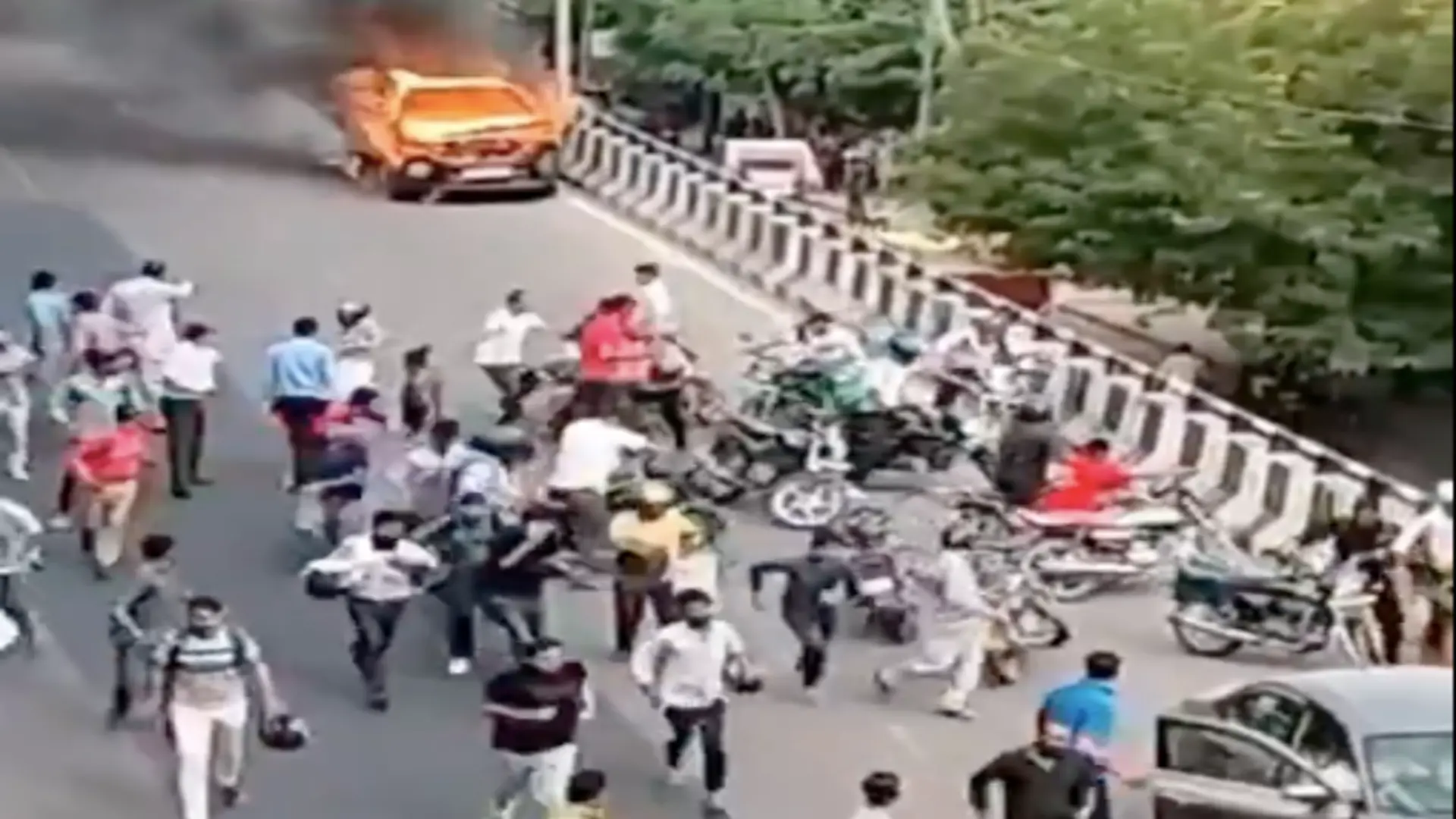 Burning car in Jaipur streets