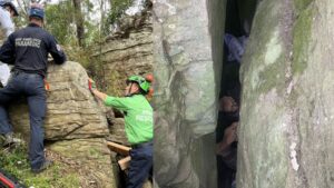 Woman Rescued After Seven-Hour Ordeal Hanging Upside Down Between Boulders While Retrieving Phone