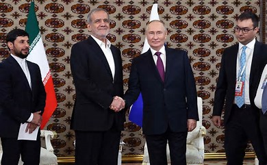 Putin And Iran's President Strengthen Ties In Central Asia Meeting