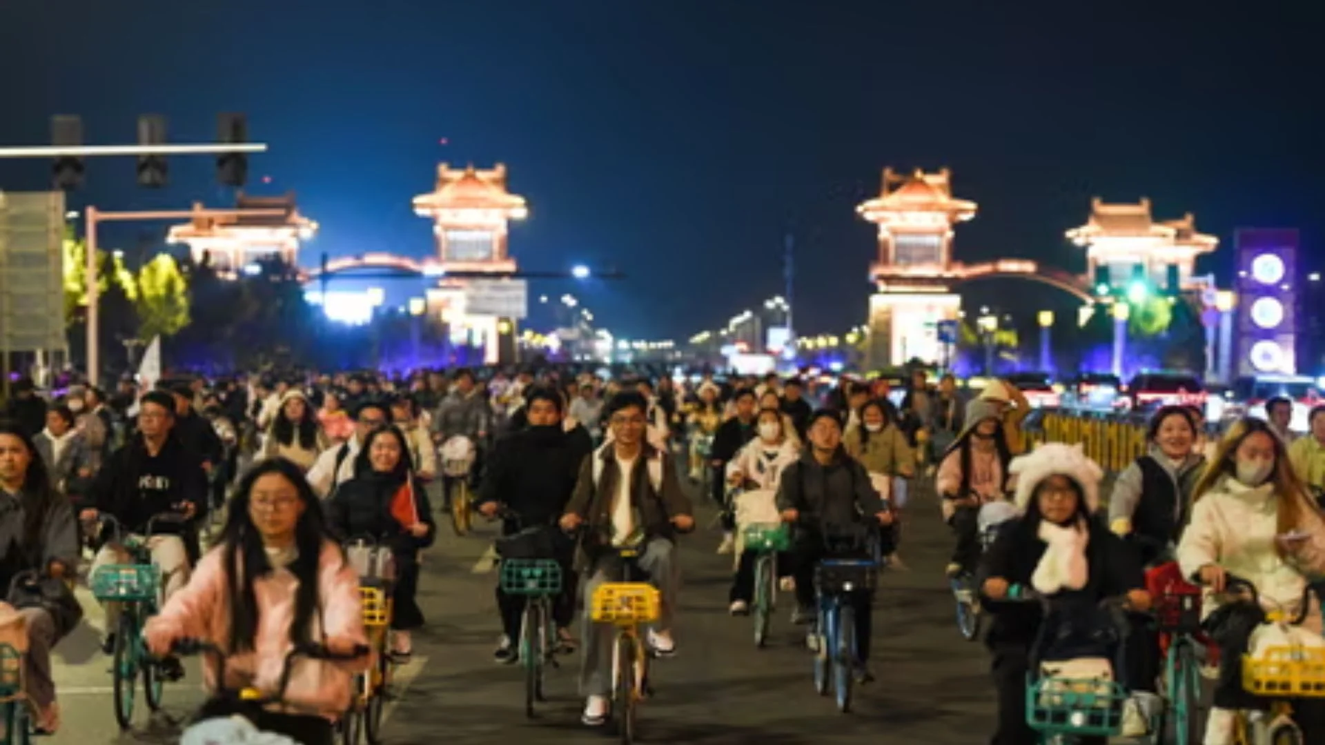 Night Cycling Trend In China As 100,000 Students Ride In Search For Good Dumplings