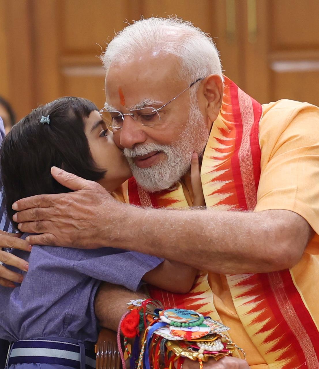 PM Modi Celebrates Raksha Bandhan at His Residence - Gallery Image
