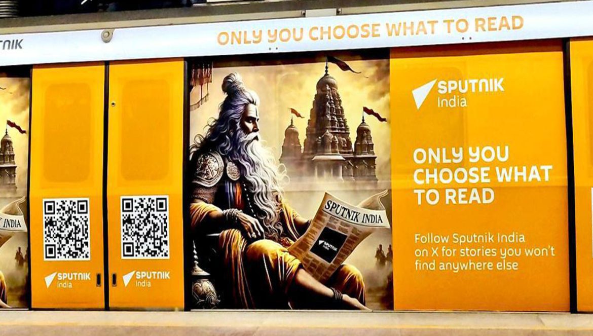 Sputnik India coils Delhi Metro's Yellow Line with their logos, slogans, and QR codes