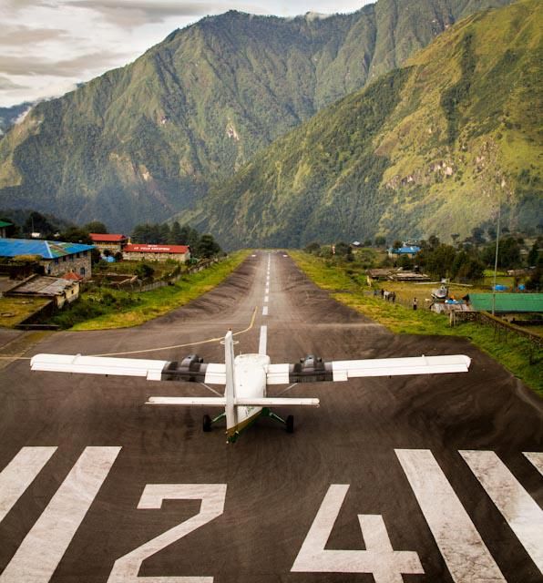Lukla Airport runway surrounded by rugged Himalayan peaks - Photo Gallery