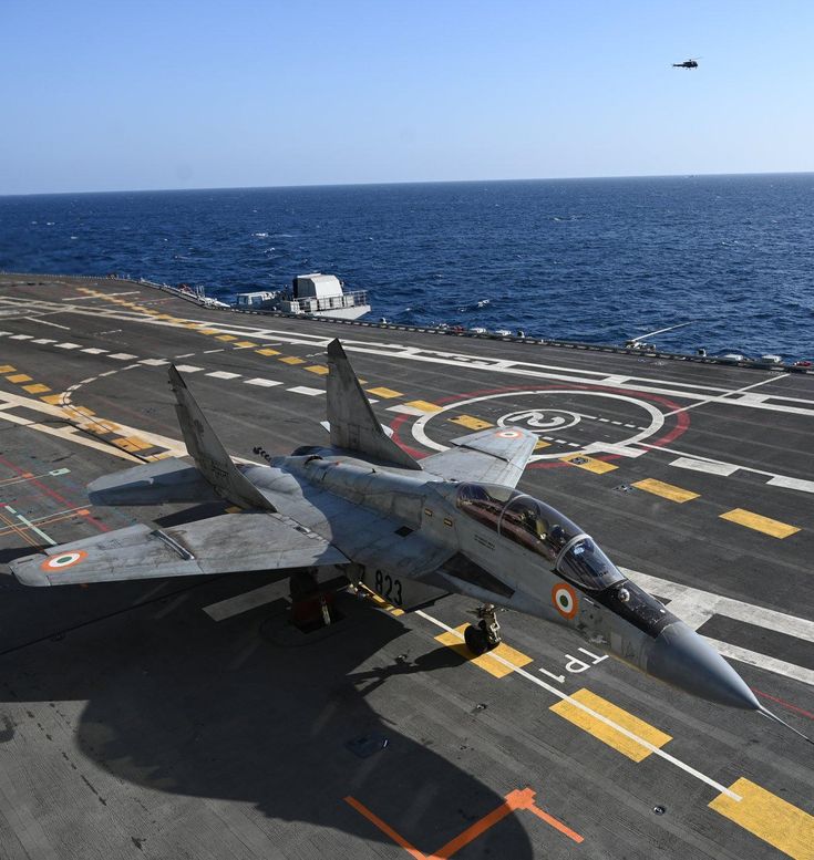 An Indian Air Force MiG-29K fighter jet on an aircraft carrier deck. - Photo Gallery