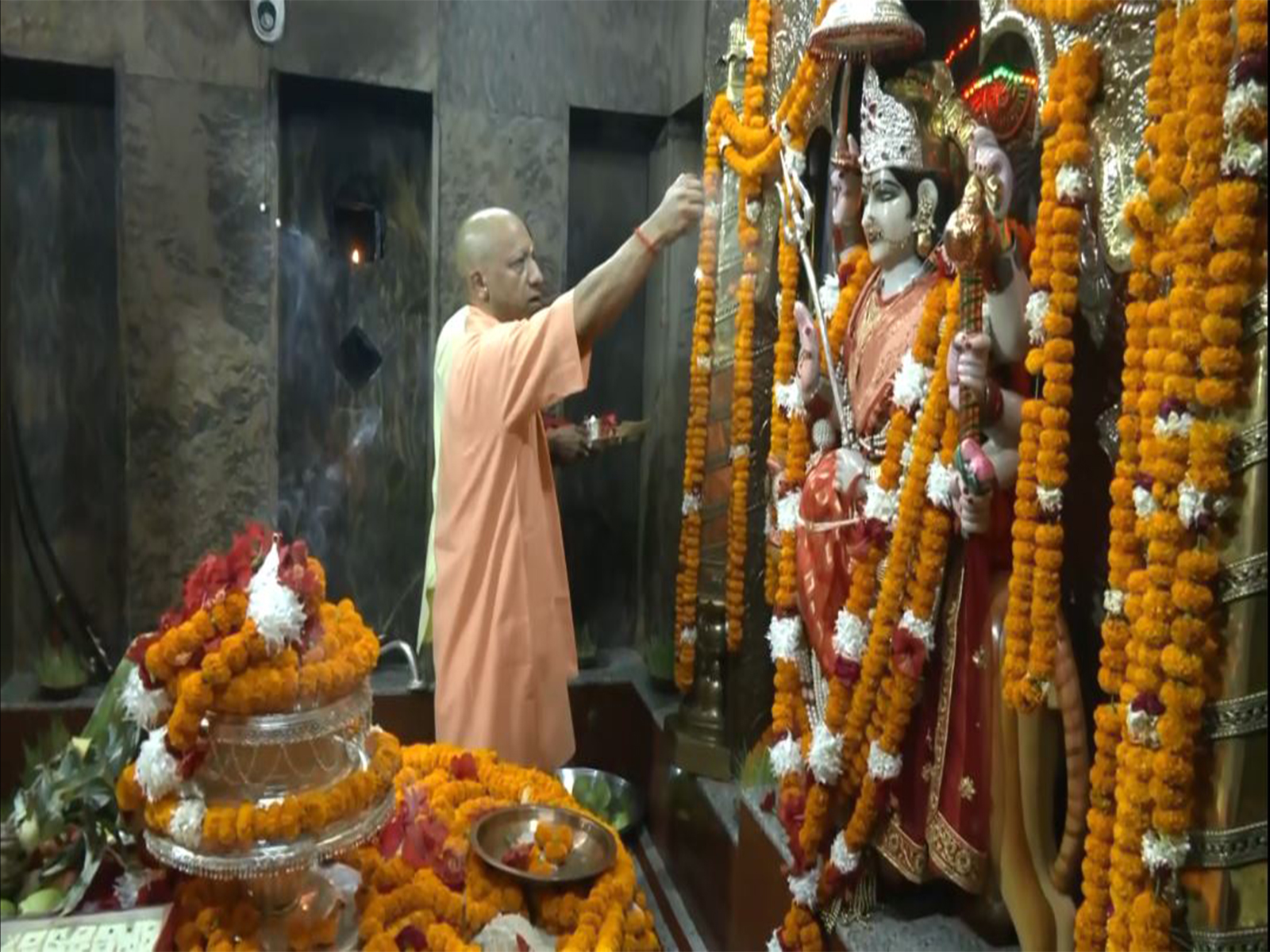 CM Yogi offers prayers at Maa Pateshwari Devi temple in Balrampur (Photo/ANI) CM Yogi offers prayers at Maa Pateshwari Devi temple in Balrampur (Photo/ANI)
