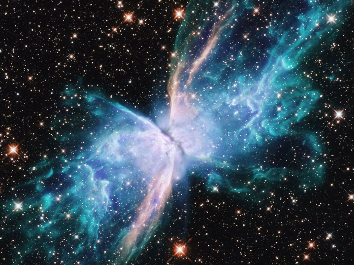 The Butterfly Nebula’s glowing twin lobes spread in space. - Photo Gallery