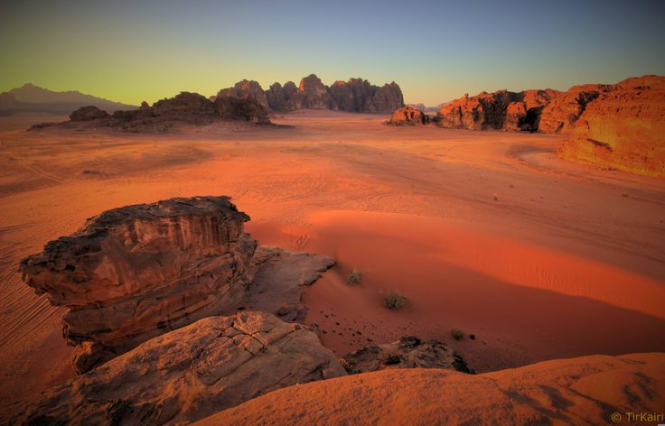 Red sandstone cliffs and rolling sand dunes - Photo Gallery