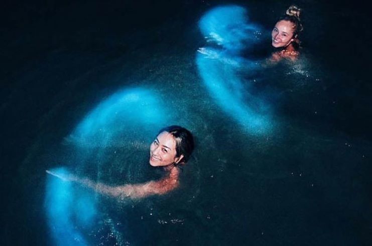 Swimming in the glowing green water of Jamaica’s Luminous Lagoon. - Photo Gallery