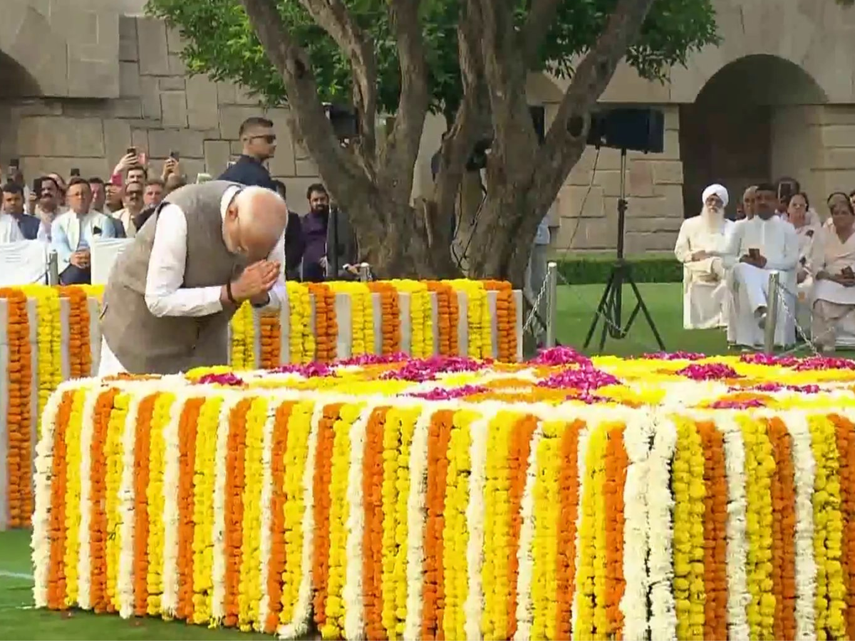 PM Modi Honors Mahatma Gandhi at Rajghat, Promises to Uphold His Vision