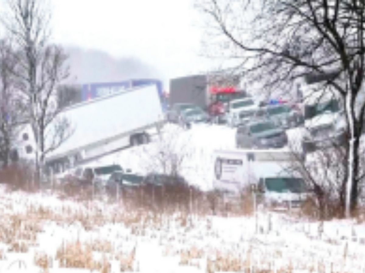 100 vehicles pile up in Michigan crash as snowstorm sweeps US