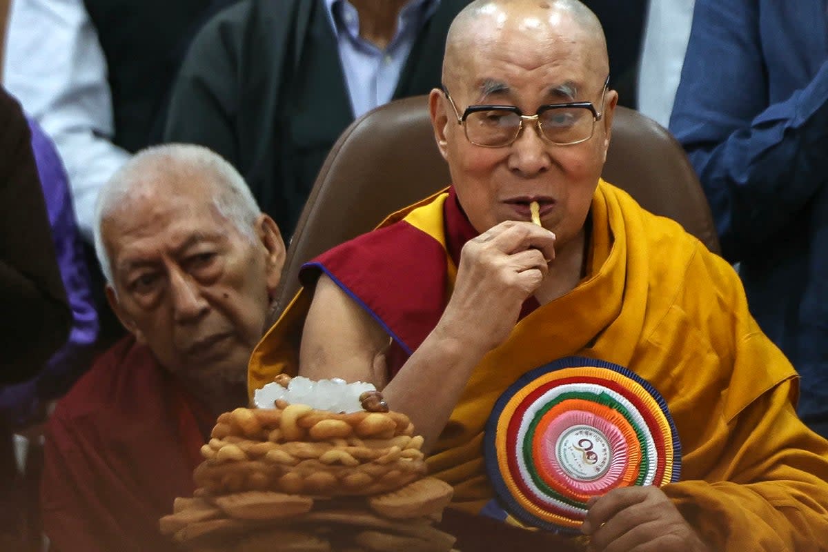 Dalai Lama receives Grammy, spreads message of peace