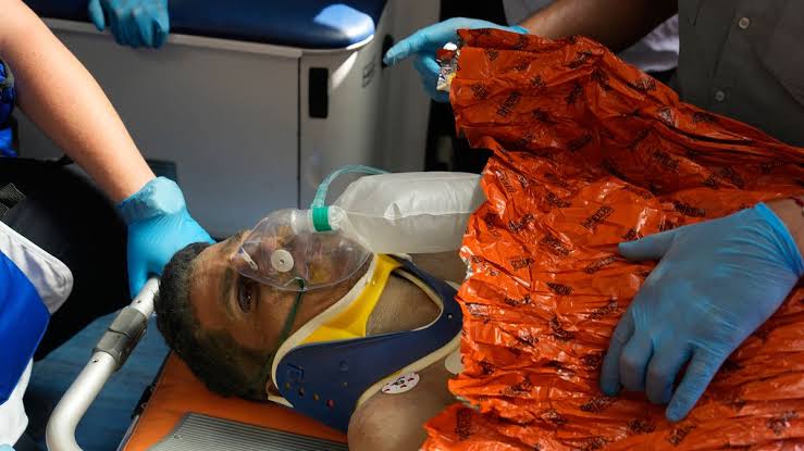 Venezuelan guard pulled alive from building basement after 8 days