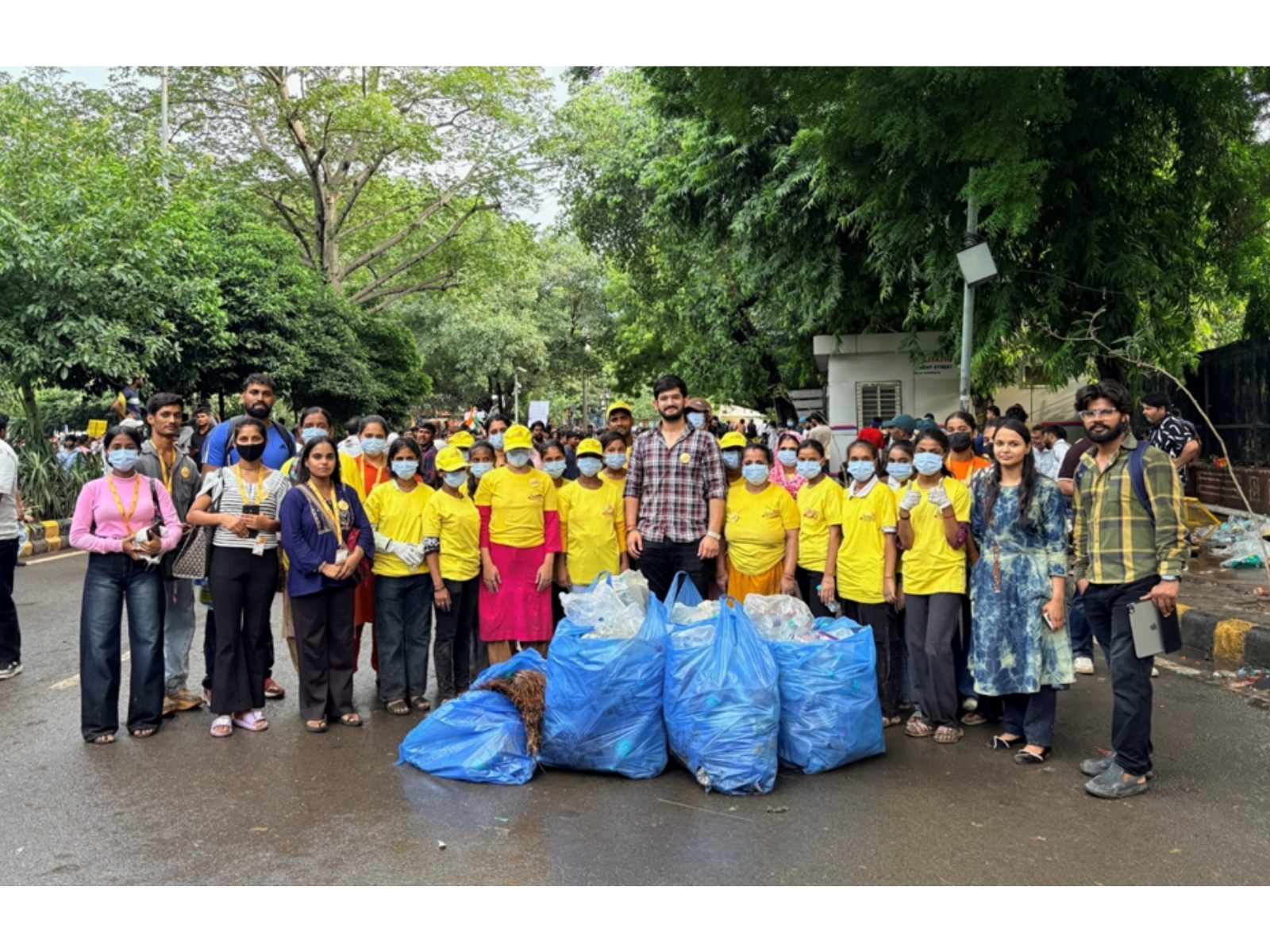 Maid In India Leads Cleanliness Drive at Delhi Protest Site. Yellow T-Shirts, Blue Bags, One Mission. Maid In India Leads Cleanliness Drive at Delhi Protest Site. Yellow T-Shirts, Blue Bags, One Mission.